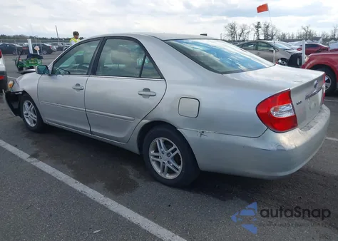 2003 Toyota Camry Le z USA, uszkodzony, nr VIN 4T1BE32K63U655864